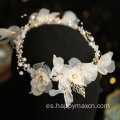 Elegantes accesorios para el cabello nupcial diadema de flores blancas